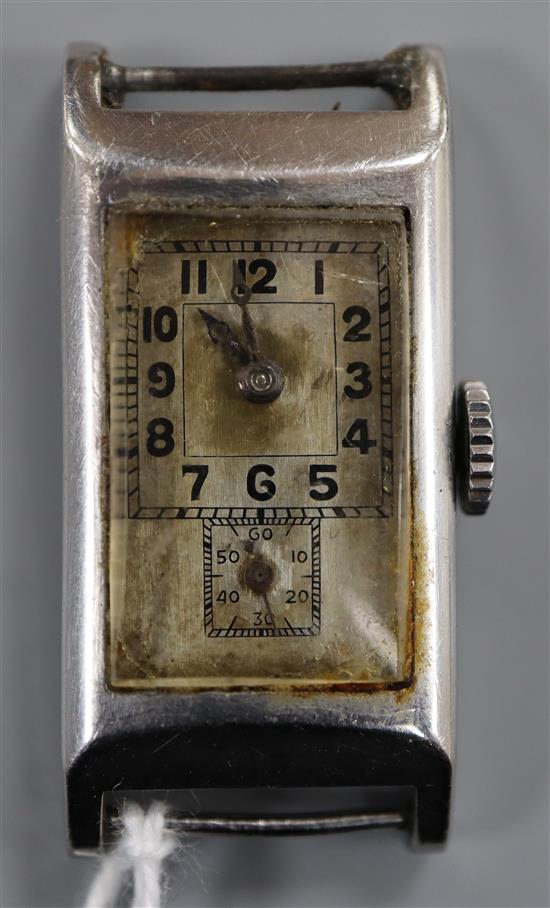 A 1930s stainless steel Longines manual wind rectangular wrist watch, with Arabic dial and subsidiary dial below,